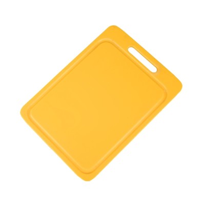 Πλάκα κοπής με λούκι και λαβή διαστάσεων 35x25x1cm σε κίτρινο χρώμα από πολυαιθυλένιο